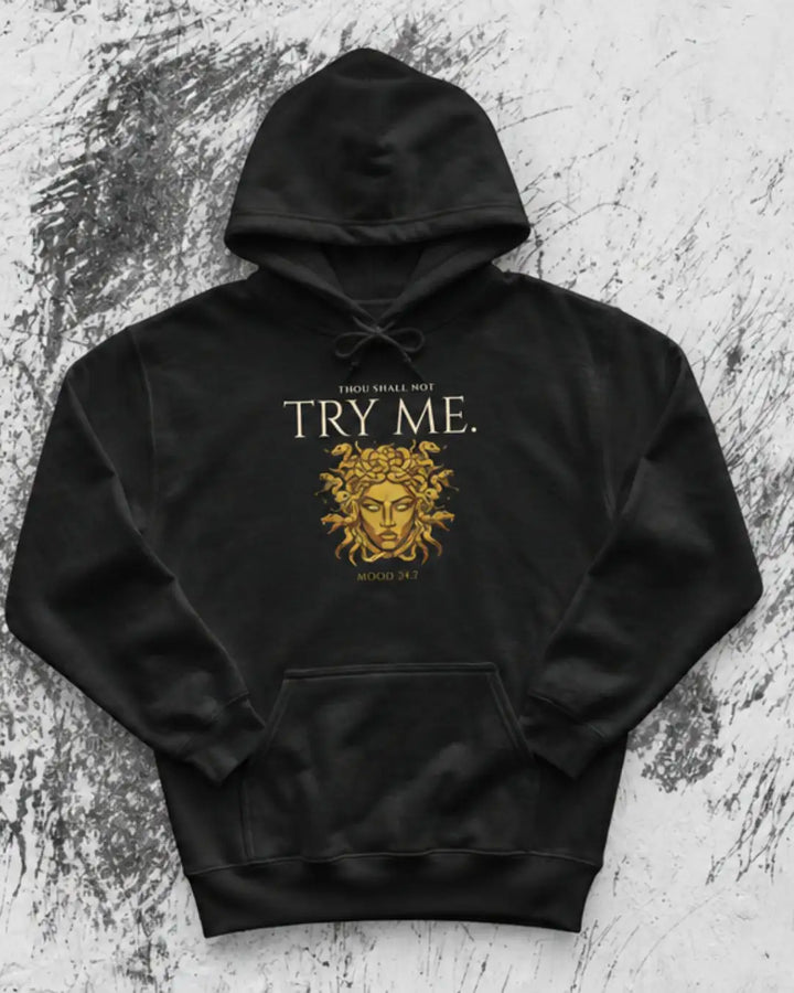 Black Hoodie with Medusa artwork on a grunge background