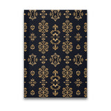 Dark navy hard cover journal with a repeating gold damask pattern.