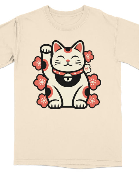 Maneki-neko cat with pink flowers, waving paw, bell collar, on a tan t-shirt.