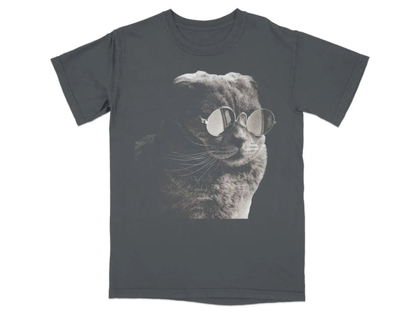 T-shirt with a graphic of a cat wearing round glasses. Graphite