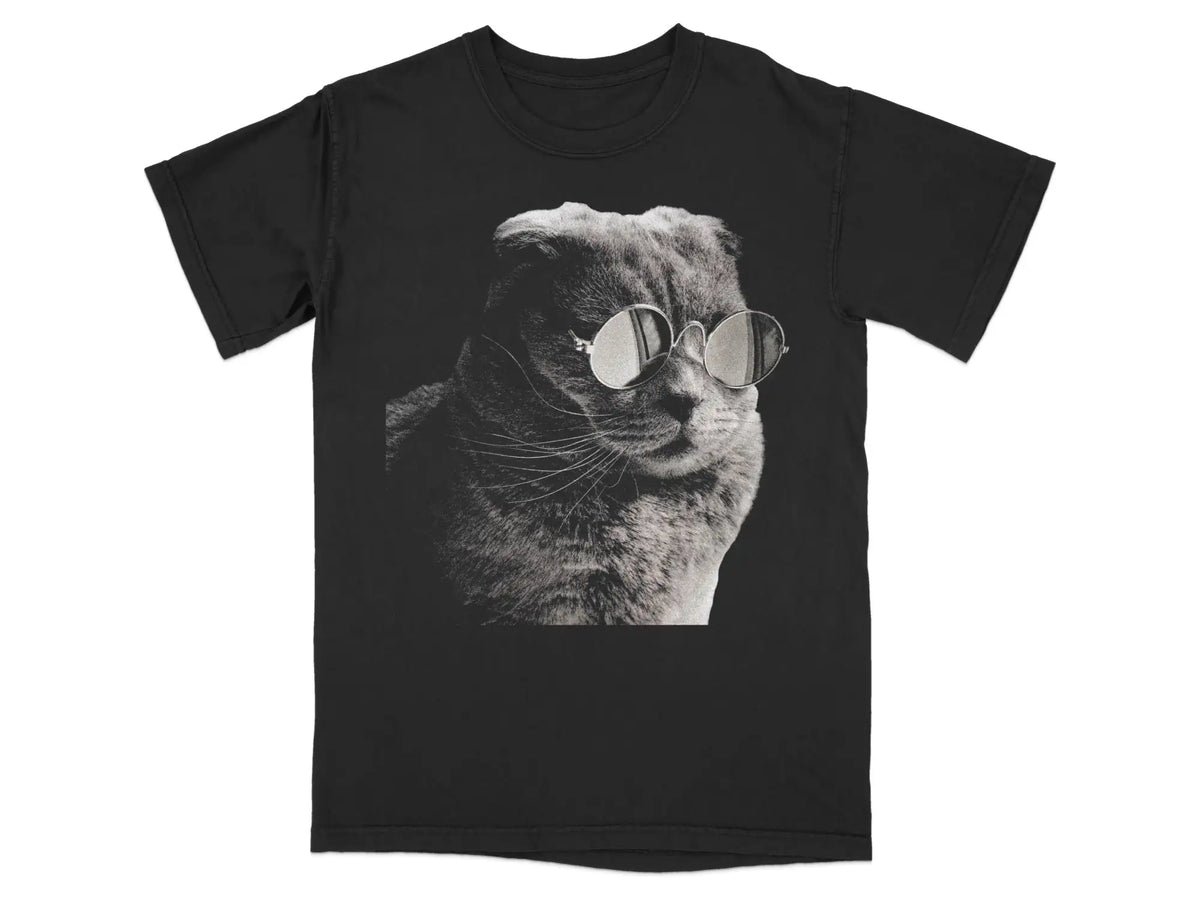 Black t-shirt with a grayscale illustration of a cat wearing round sunglasses. Black