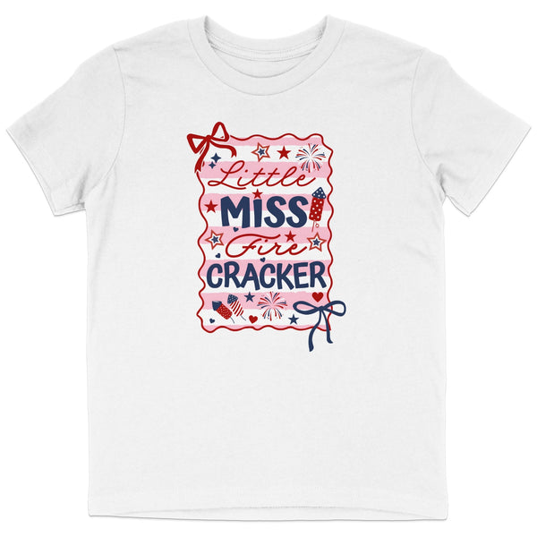 White t-shirt with "Little Miss Fire Cracker" text and patriotic graphics.