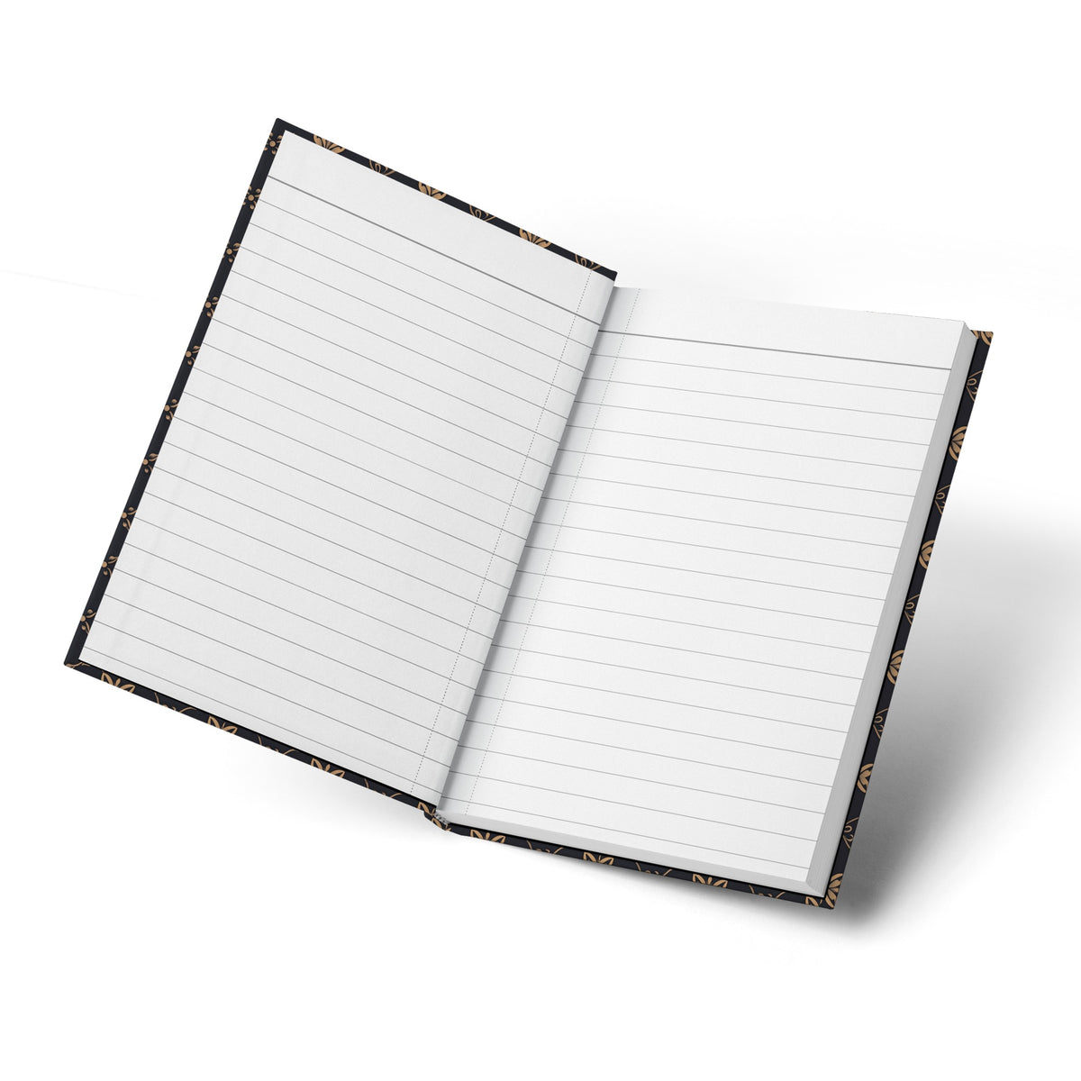 Open notebook with lined pages and a black cover featuring a gold floral pattern.