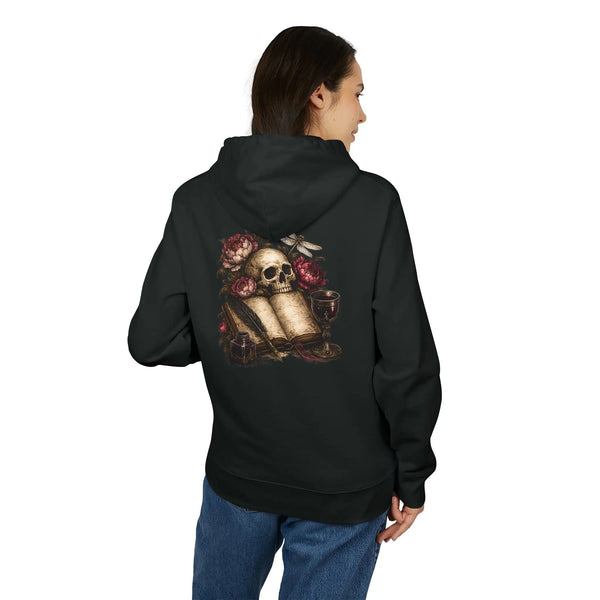 Skull and flowers on an open book with a wine glass, back of hoodie. 