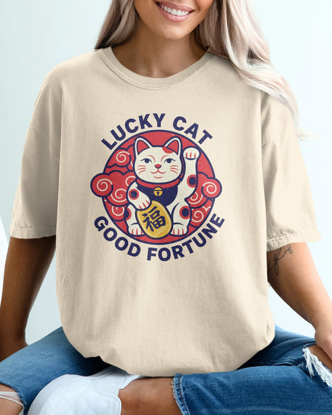 Cream t-shirt with "Lucky Cat Good Fortune" text and a maneki-neko graphic.