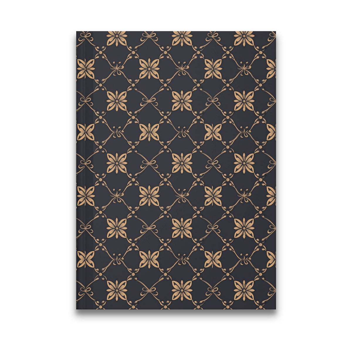 Dark gray journal cover with repeating gold floral and bow pattern.