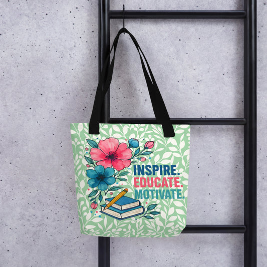 Tote bag with floral design and text 'Inspire. Educate.
