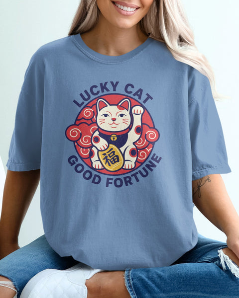 Blue t-shirt with a circular "Lucky Cat" graphic featuring a waving cat and Japanese characters.