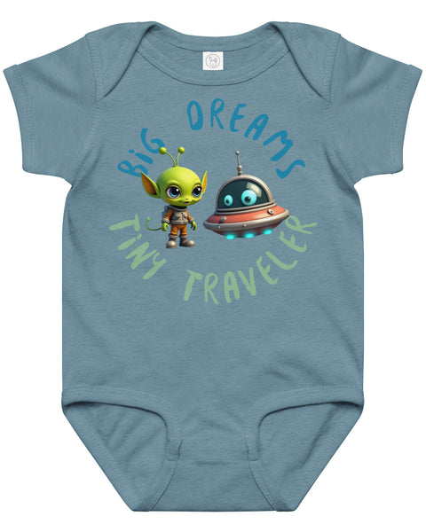 Vintaage Indigo baby onesie with a cute alien and spaceship illustration and the phrase "Big Dreams Tiny Traveler" in playful font