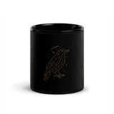 Starlit Crow black ceramic mug with gold constellation crow artwork