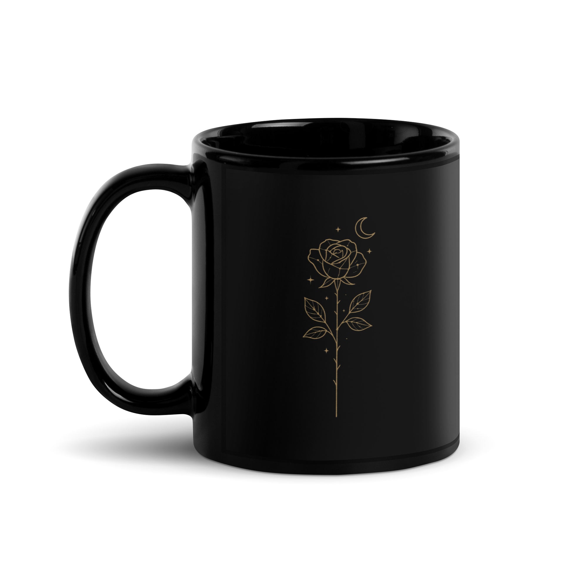 Black ceramic mug with a golden Starlit  Rose design printed three times around the surface. Left handle view of the 11 oz size.