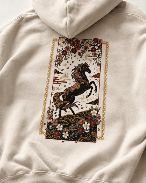 Beige hoodie with a horse design on the back against a white background