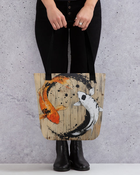 Koi tote bag being held by model