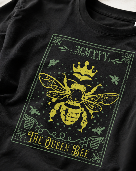Black t-shirt with yellow bee design and text on a plain background