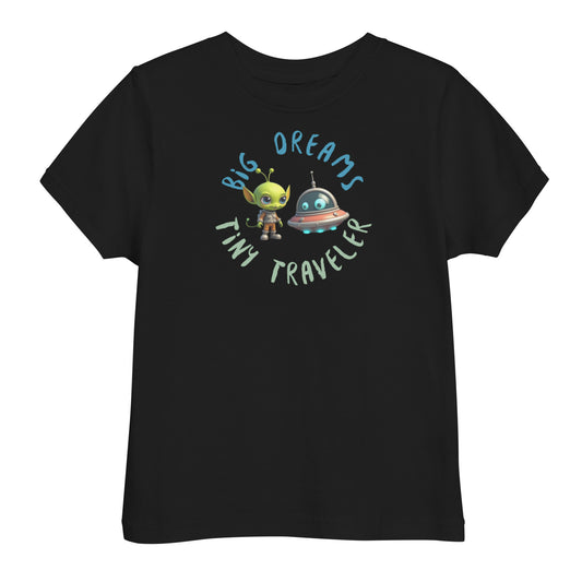 Black toddler t-shirt featuring a green alien and spaceship with the phrase "Big Dreams Tiny Traveler" in playful lettering